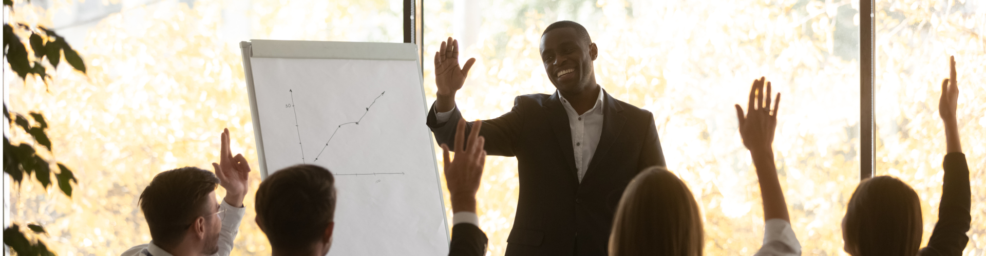 corporate employee presenting in a meeting